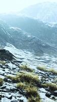 lanscape with barren mountain which is covered with ice video