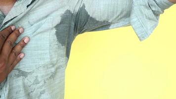 man with wet armpits Smelly odor from sweat . video