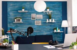 Professional setup for online talk show at home studio of blogger. Influencer recording social media content with professional equipment and digital web internet streaming station photo
