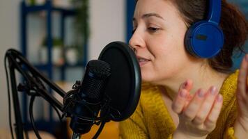 Entertainment blogger broadcasting from home studio new show in the night. On-air online production internet broadcast show host streaming live content, recording digital social media communication photo