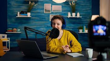 Creative vlogger recording podcast using production station in home studio. Creative online show On-air production internet broadcast host streaming live content, digital social media communication photo