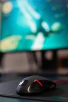 Close up of mouse in gaming home studio playing online videogames on professional powerful computer during live tournament photo