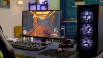 Empty room with nobody in it with professional gaming equipment. Pro gamer using powerful computer for first person shooter game during online competition photo