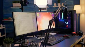 Close-up of streaming chat in empty gaming studio during online games tournament. Pro streamer losing space shooter games using technology network wireless photo