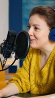 Famous blogger in home studio broadcasting using modern technology. Creative online show on-air production internet broadcast host streaming live content, recording digital social media communication photo