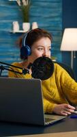 Entertainment blogger doing selfie during broadcast working from home studio. On-air online production internet podcast show host streaming live content, recording digital social media communication photo