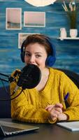 Creative vlogger recording podcast using production station in home studio. Creative online show On-air production internet broadcast host streaming live content, digital social media communication photo