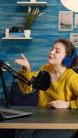 blogger reading emails on laptop with green screen display during broadcast. Creative online show On-air production internet broadcast host streaming live content using chroma key laptop photo
