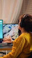 Angry pro gamer while playing shooter games beacuse she losing. Gamer over of mock-up videogame player, performing in stylish cyber room, virtual shooter game in cyberspace, pc gaming tournament photo