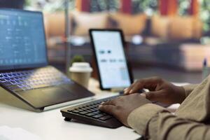 Professional software developer at his desk working on AI coding and machine learning projects, showcasing innovation in software development and digital business. Internet of things. Close up. photo