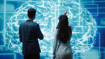 Engineers use VR headset and AI neural networks modeled after human brain to solve complex problems. IT experts using artificial intelligence and virtual reality tech to look at data, camera B photo