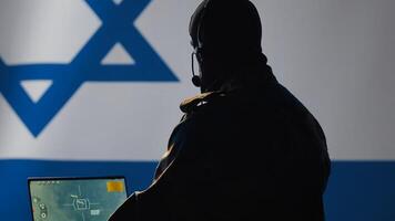 Israeli air defense operator using radar detecting missile attacks and conducting space surveillance and satellite tracking. Israel Mossad agent using military software preventing rockets, camera A photo