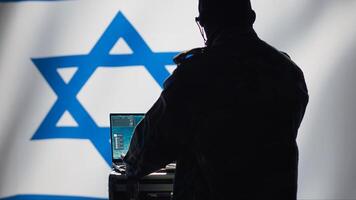Iranian spy in intelligence agency control room uses military tech to identify threats during Arab Israeli conflict. Mossad secret agent uses software to do war covert operations, camera A photo