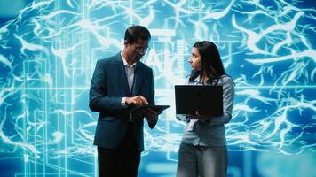 Teamworking colleagues using AI neural networks modeled after human brain to solve complex problems. Team of IT specialists using deep learning to look at data and complete tasks, camera A photo