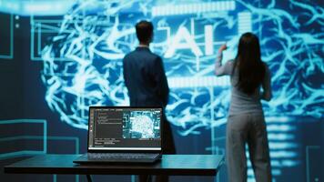 Engineers use AR tech to visualize AI neural networks brain, solving company problems. IT professionals using artificial intelligence augmented reality hologram, camera A photo