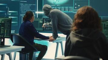 Governmental agency team conducting cyber security monitoring and threat detection tactics. IT experts work on cybercrime prevention, network security and information protection. Camera A. photo