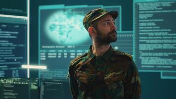 Military hackers in a secret service cyber operations room working on national security. Fighting cyber terrorism during information war and protecting against digital conflicts, high tech. Camera A. photo