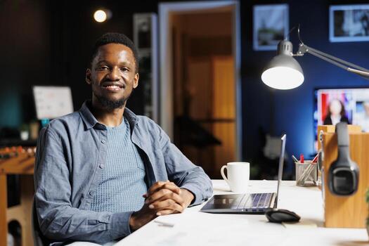 Financial analyst doing remote work on economic reports, trying to increase company profit by evaluating monthly revenue balance with online statistics. Advisor reviews funds for investment. photo