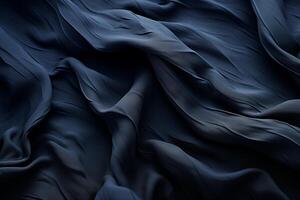 A close-up of dark fabric with deep wrinkles and soft lighting, highlighting the intricate folds and texture. photo