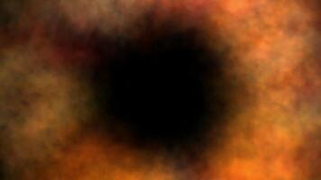 an abstract image of a black hole with a red and orange background video