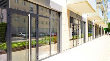 Panoramic windows of new commercial premises. Commercial property in development standard for rent. photo