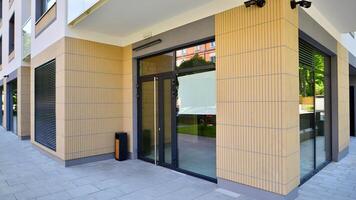 Panoramic windows of new commercial premises. Commercial property in development standard for rent. photo