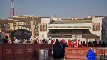 Medina, Saudi Arabia on March 1, 2024. Queues of female Umrah pilgrims from all over the world line up to enter Raudhah photo