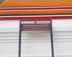 Bangkok, Thailand on July 22 2023. Information board regarding the opening hours of Wat Phra Chettuphon Wimon Mangkhlaram Ratchaworamahawihan photo