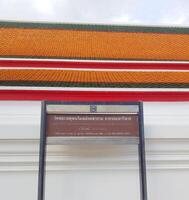Bangkok, Thailand on July 22 2023. Information board regarding the opening hours of Wat Phra Chettuphon Wimon Mangkhlaram Ratchaworamahawihan photo