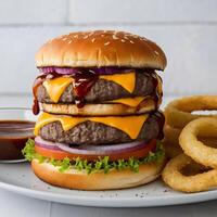 Close-up of burger on table, Beef burger with cheese, tomatoes, red onions, cucumber and lettuce photo
