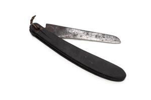 Old rusty knife, isolated on white background photo
