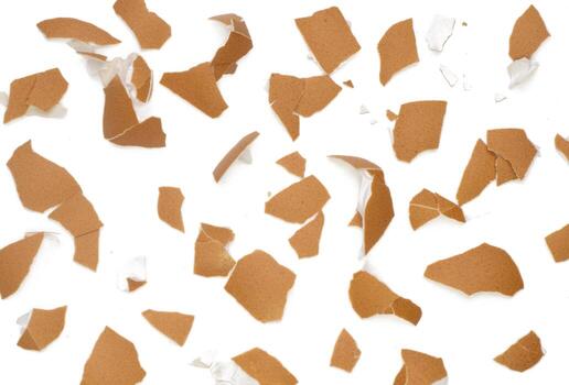 Isolated Broken eggshell, Top view broken eggshells stacked pattern on white background photo