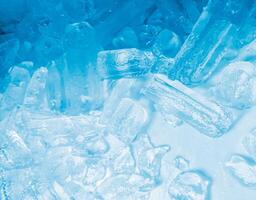 icecubes background,icecubes texture,icecubes wallpaper,ice helps to feel refreshed and cool water from the icecubes helps the water refresh your life and feel good.ice drinks for refreshment business photo