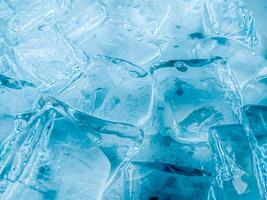icecubes background,icecubes texture,icecubes wallpaper,ice helps to feel refreshed and cool water from the icecubes helps the water refresh your life and feel good.ice drinks for refreshment business photo