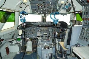 close up shot on helicopter console inside cockpit. Levers, parts and control buttons in the cockpit of an aircraft. photo