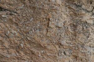 Rough rock and stone surface texture photo