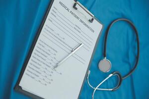 In a hospital setting, the presence of a doctor's physician book and stethoscope carries with it an air of professionalism and dedication to patient care. photo