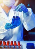 professional chemist woman laboratory using scientific microscope for science research, chemistry scientist with microbiology medicals equipment technology to working with medicine biology experiment photo