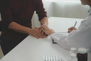 Female doctors shake hands with patients encouraging each other To offer love, concern, and encouragement while checking the patient's health. Concept Health care and Social Security photo