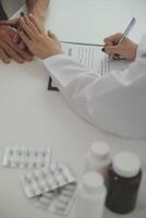 Female doctors shake hands with patients encouraging each other To offer love, concern, and encouragement while checking the patient's health. Concept Health care and Social Security photo