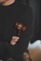 Law theme, gavel or mallet of the judge, lawyer enforcement officers, evidence-based cases taken into account in the court abount business, legislation. photo