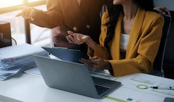 Team of business people working together in the meeting room office, teamwork background charts and graphs banner, double exposure successful teamwork,business planning concept. photo