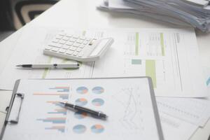 Team of business people working together in the meeting room office, teamwork background charts and graphs banner, double exposure successful teamwork,business planning concept. photo