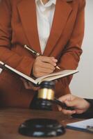 Lawyer, legal advisor, businessman brainstorming information on agreement details Business contracts in legal processing books for accuracy in contract documents. joint financial investment. photo