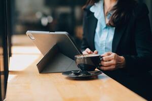 Coffee Cup on the Table with Computer Keyboard for Business Concept. photo