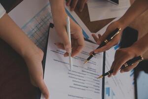Business meetings to analyze investment strategies and brainstorm sales plans for a more profitable business. photo