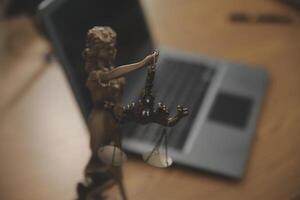 Judge gavel with Justice lawyers having team meeting at law firm background. Concepts of Law and Legal services. photo