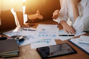 Business meetings to analyze investment strategies and brainstorm sales plans for a more profitable business. photo