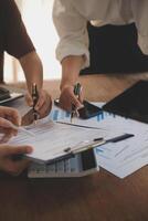 Business meetings to analyze investment strategies and brainstorm sales plans for a more profitable business. photo