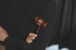 Law theme, gavel or mallet of the judge, lawyer enforcement officers, evidence-based cases taken into account in the court abount business, legislation. photo